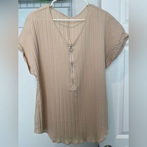 Beige short sleeve zipper front blouse. Size XL.